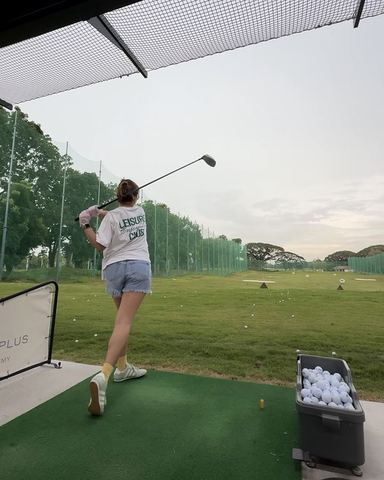 At the driving range